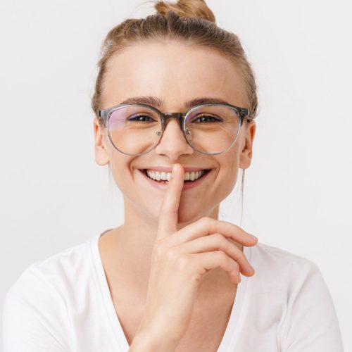 photo-of-cheerful-caucasian-woman-making-silence-g-DL2JMLB.jpg